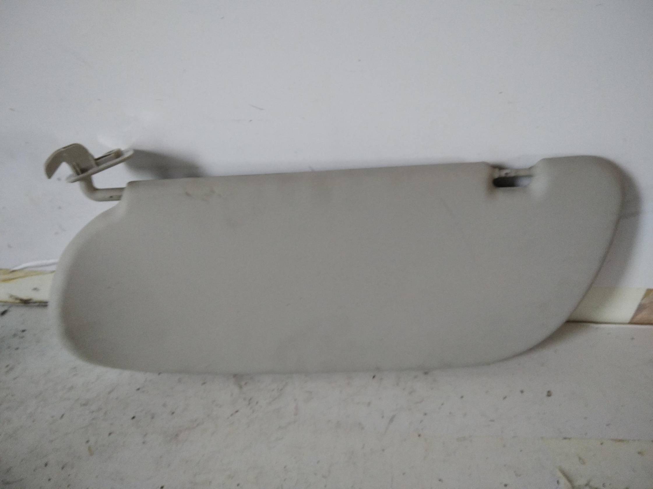 Aletta parasole parabrezza dx.